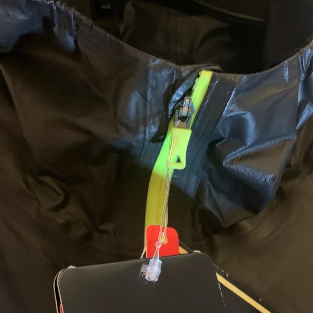 The North Face Men's Black Raincoat with Bright Yellow Zipper